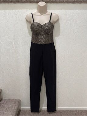 MATERIAL GIRL Metallic Bustier Black Jumpsuit
Size M NWOT